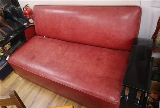 An Art Deco style red leather settee W.183cm